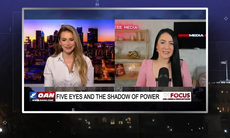 Video still from In Focus on One America News Network showing a split screen of the host on the left side, and on the right side is the guest, Maria Zeee.