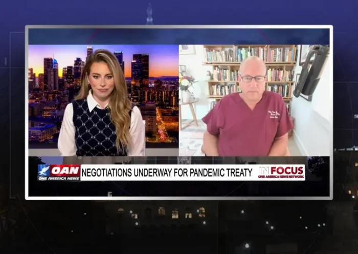 Video still from In Focus on One America News Network showing a split screen of the host on the left side, and on the right side is the guest, Dr. Pierre Kory.