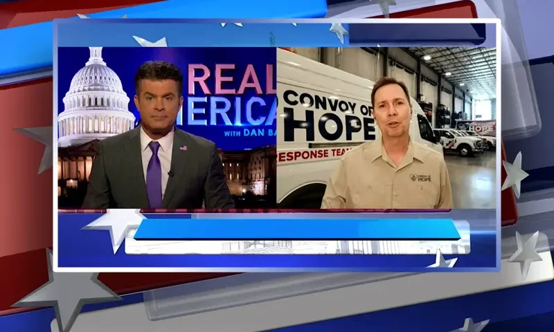 Video still from Real America on One America News Network showing a split screen of the host on the left side, and on the right side is the guest, Ethan Forhetz.