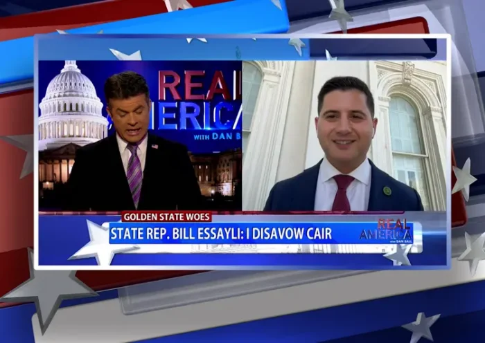 Video still from Real America on One America News Network showing a split screen of the host on the left side, and on the right side is the guest, Bill Essayli.