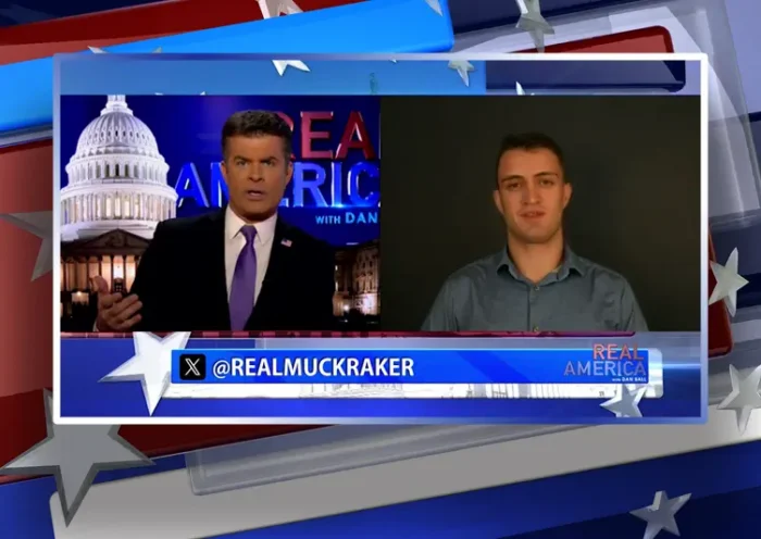 Video still from Real America on One America News Network showing a split screen of the host on the left side, and on the right side is the guest, Anthony Rubin.