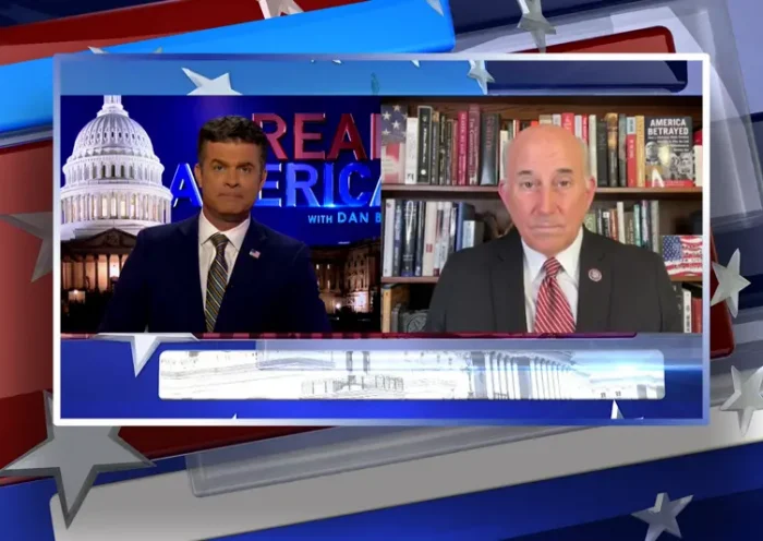 Video still from Real America on One America News Network showing a split screen of the host on the left side, and on the right side is the guest, Louie Gohmert.
