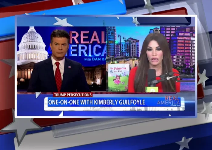 Video still from Real America on One America News Network showing a split screen of the host on the left side, and on the right side is the guest, Kimberly Guilfoyle.
