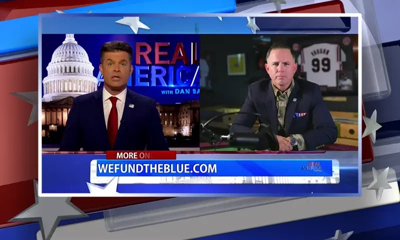 Video still from Real America on One America News Network showing a split screen of the host on the left side, and on the right side is the guest, John Rourke.