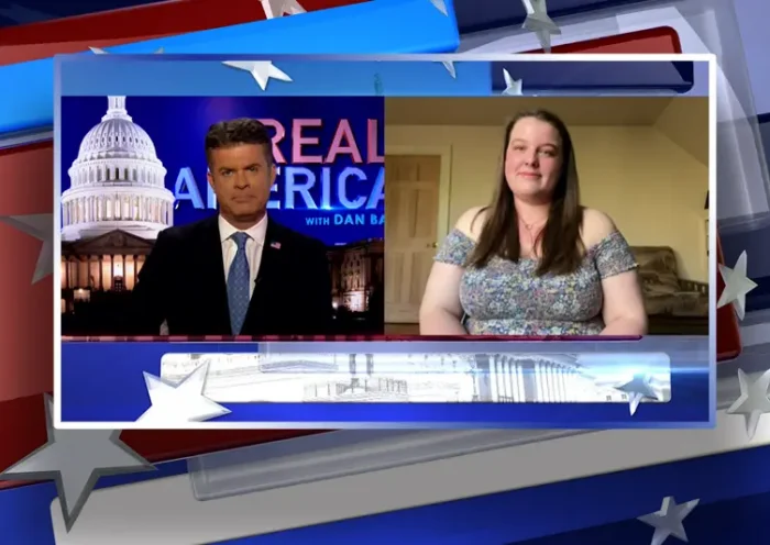 Video still from Real America on One America News Network showing a split screen of the host on the left side, and on the right side is the guest, Marcayla Amadei.
