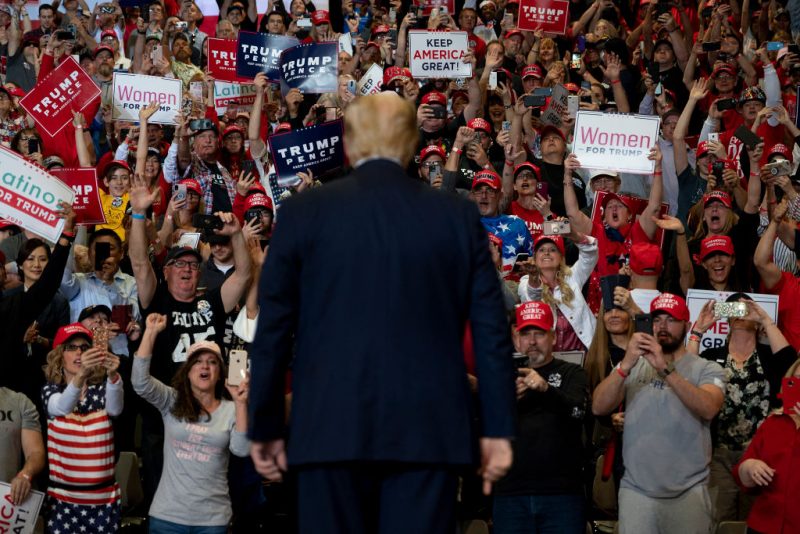 TOPSHOT - Supporters cheer as US President Donald Trump arrives to deliver remarks at a Keep America Great rally in Las Vegas, Nevada, on February 21, 2020. (Photo by JIM WATSON / AFP) (Photo by JIM WATSON/AFP via Getty Images)