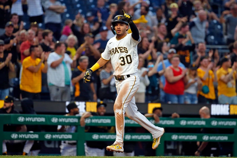 PITTSBURGH, PA - MAY 22:  Tucupita Marcano #30 of the Pittsburgh Pirates celebrates after hitting a grand slam home run in the seventh inning against the Texas Rangers during inter-league play at PNC Park on May 22, 2023 in Pittsburgh, Pennsylvania.  (Photo by Justin K. Aller/Getty Images)