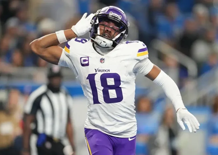 Justin Jefferson #18 of the Minnesota Vikings celebrates after a touchdown during the third quarter in the game against the Detroit Lions at Ford Field on January 07, 2024 in Detroit, Michigan. (Photo by Nic Antaya/Getty Images)