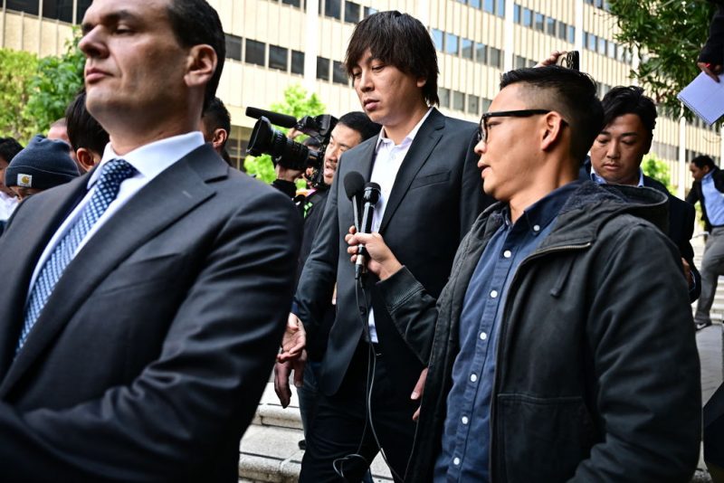 Ippei Mizuhara departs federal court after his arraignment in Los Angeles, California, on May 14, 2024. Shohei Ohtani's former interpreter, Mizuhara, has agreed to plead guilty over charges of illegally transferring nearly $17 million from the baseball star's bank account in order to pay off gambling debts. (Photo by Frederic J. Brown / AFP) (Photo by FREDERIC J. BROWN/AFP via Getty Images)