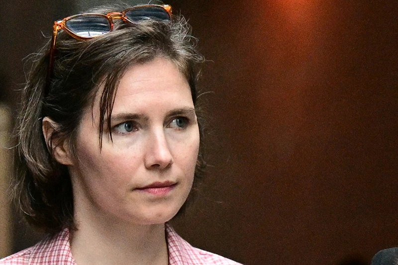 ITALY-JUSTICE-US-KNOX
US Amanda Knox arrives at the courthouse in Florence, on June 5, 2024 before a hearing in a slander case, related to her jailing and later acquittal for the murder of her British roommate in 2007. The American was only 20 when she and her Italian then-boyfriend were arrested for the brutal killing of 21-year-old fellow student Meredith Kercher at the girls' shared home in Perugia. The murder began a long legal saga where Knox was found guilty, acquitted, found guilty again and finally cleared of all charges in 2015. (Photo by Tiziana FABI / AFP) (Photo by TIZIANA FABI/AFP via Getty Images)