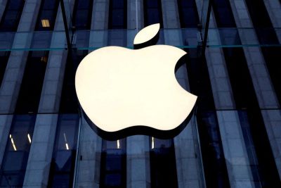 FILE PHOTO: The Apple Inc. logo is seen hanging at the entrance to the Apple store on 5th Avenue in Manhattan, New York, U.S., October 16, 2019. REUTERS/Mike Segar/
