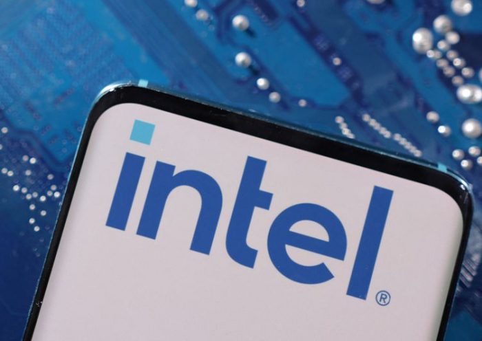 FILE PHOTO: A smartphone with a displayed Intel logo is placed on a computer motherboard in this illustration taken March 6, 2023. REUTERS/Dado Ruvic/Illustration/file photo
